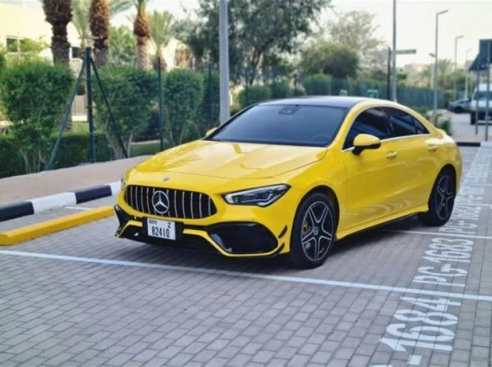 Mercedes Benz CLA45  2023 YELLOW RENTAL IN DUBAI - undefined